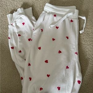 White Joggers with Red Heart Pattern